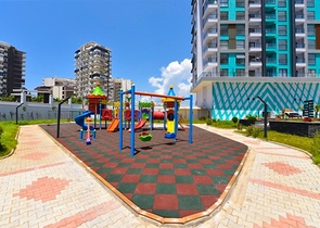 Квартира планировки 1+1 в новом комплексе в районе Махмутлар