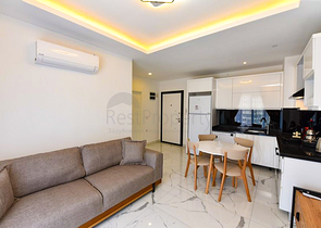 Квартира планировки 1+1 в новом комплексе в районе Махмутлар