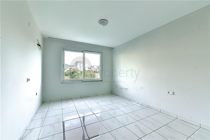 Просторная квартира 1+1 в 400 м от моря в районе Махмутлар