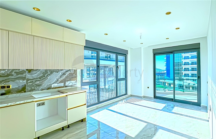 Квартира 1+1 в районе Тосмур в 200м от моря