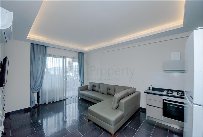 Квартира 1+1 в новом жилом комплексе района Махмутлар