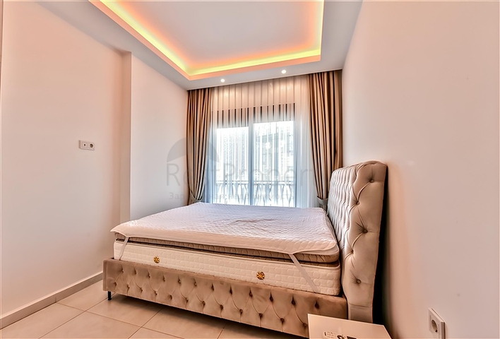 Квартира 1+1  в аренду в районе Махмутлар