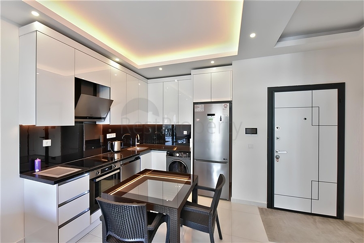 Квартира 1+1  в аренду в районе Махмутлар