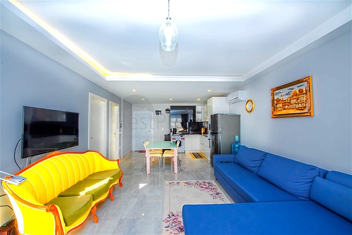 Просторная двухкомнатная квартира в Махмутларе