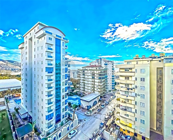 Просторная двухкомнатная квартира в Махмутларе