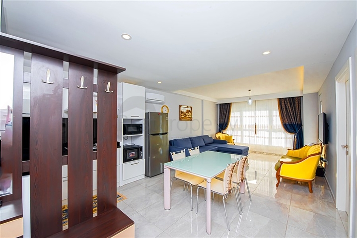 Просторная двухкомнатная квартира в Махмутларе