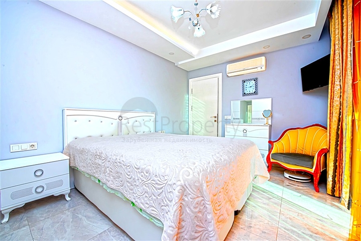 Просторная двухкомнатная квартира в Махмутларе