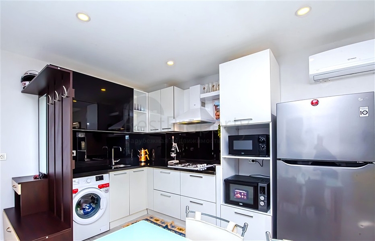 Просторная двухкомнатная квартира в Махмутларе