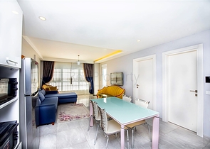 Просторная двухкомнатная квартира в Махмутларе