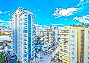 Просторная двухкомнатная квартира в Махмутларе