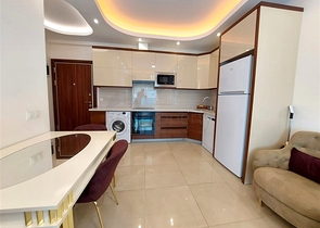 Двухкомнатные апартаменты в Махмутларе