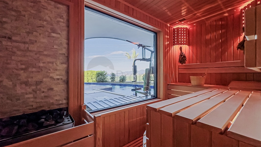 Вилла 6+1 с видом на море в районе Каргыджак 