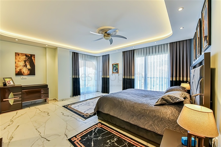 Вилла 6+1 с видом на море в районе Каргыджак 