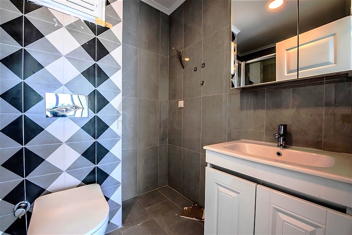 Квартира 1+1 в новом жилом комплексе района Махмутлар по выгодной цене 