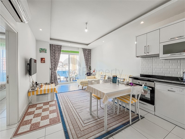 Апартаменты 1+1 в районе Махмутлар