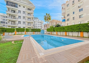 Апартаменты 1+1 в районе Махмутлар