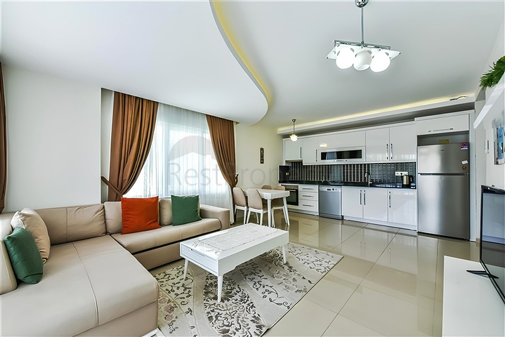 Двухкомнатная квартира в Махмутларе в 350 м от моря