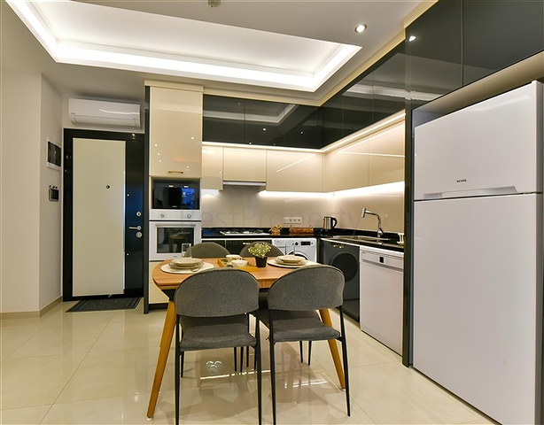 Просторная  1+1 в новом комплексе района Махмутлар