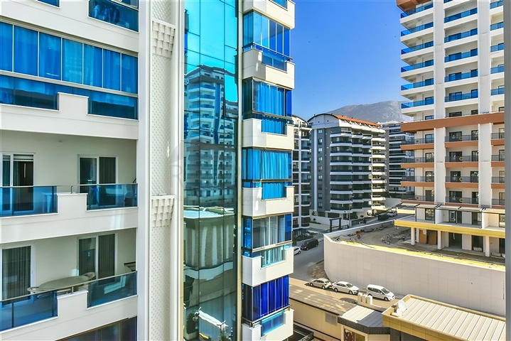 Просторная  1+1 в новом комплексе района Махмутлар