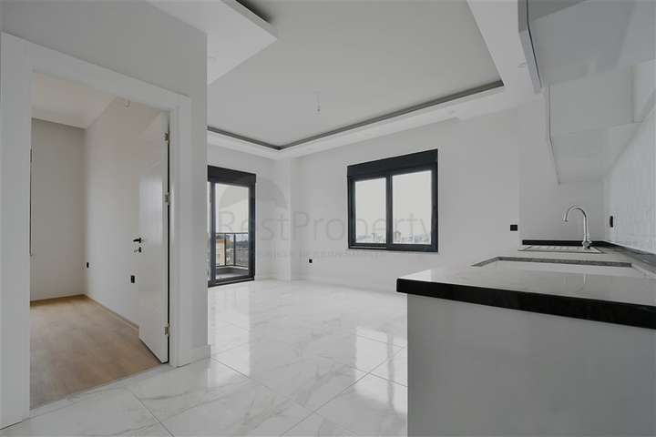 Квартира 1+1 в районе Авсаллар по привлекательной цене 