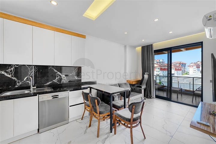 Двухкомнатная квартира в новом проекте c развитой инфраструктурой в Авсалларе