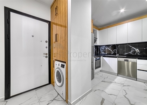 Двухкомнатная квартира в новом проекте c развитой инфраструктурой в Авсалларе