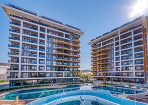 Двухкомнатная квартира в новом проекте c развитой инфраструктурой в Авсалларе