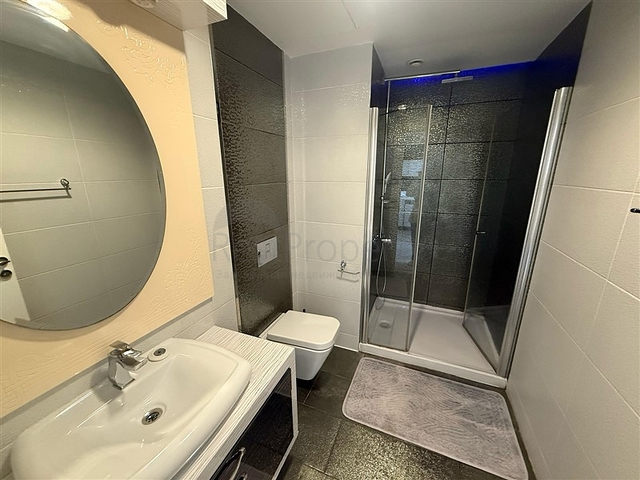 Двухкомнатная квартира в шикарном комплексе района Махмутлар