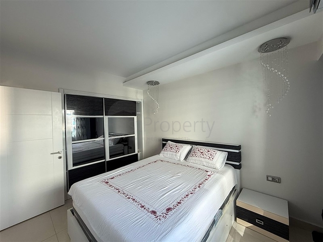 Двухкомнатная квартира в шикарном комплексе района Махмутлар