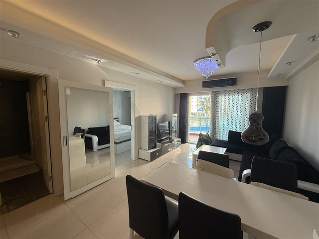 Двухкомнатная квартира в шикарном комплексе района Махмутлар