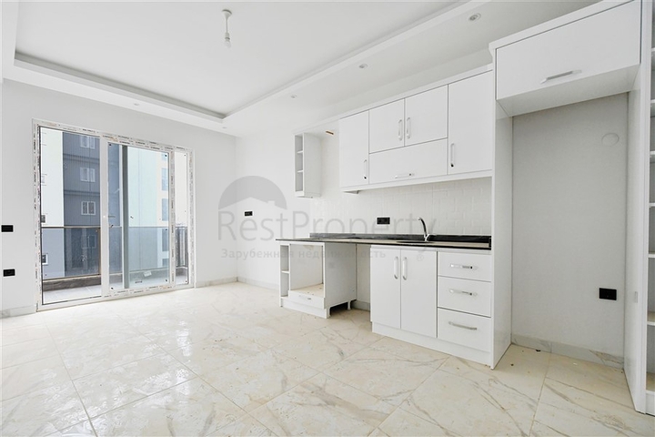 Двухкомнатная квартира в комплексе района Авсаллар 