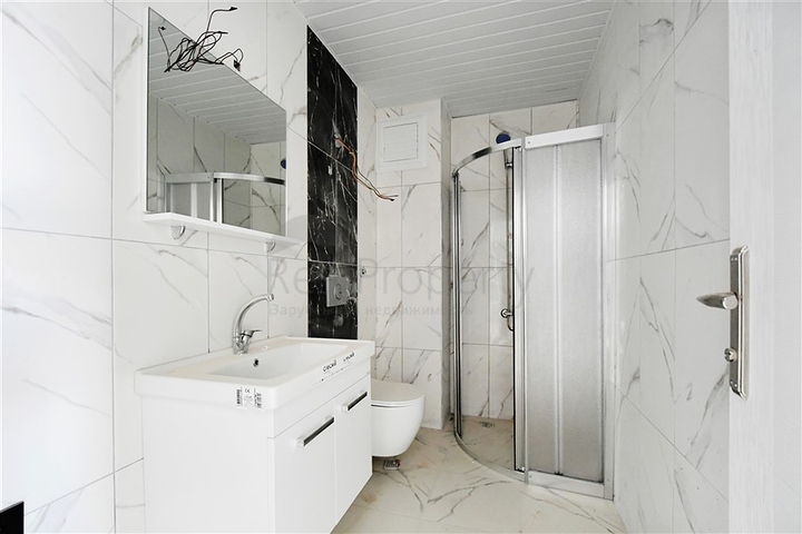 Двухкомнатная квартира в комплексе района Авсаллар 