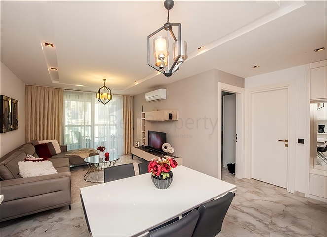 Квартира 1+1 с видом на море в районе Каргыджак