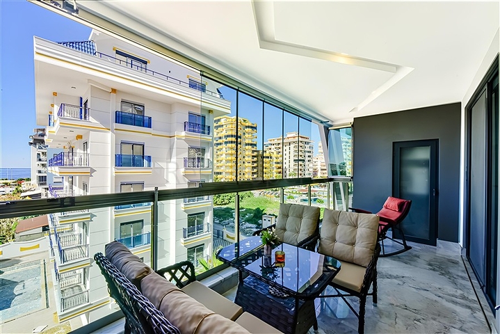 Квартира 1+1 с видом на море в районе Каргыджак