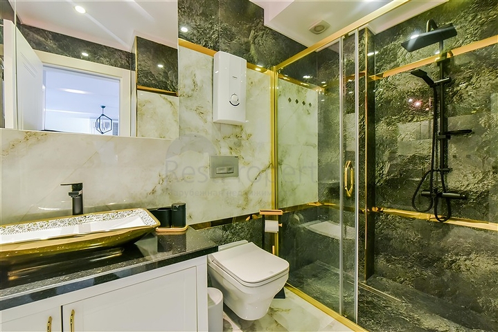 Квартира 1+1 с видом на море в районе Каргыджак