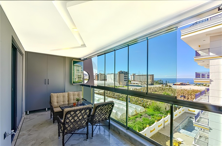 Квартира 1+1 с видом на море в районе Каргыджак