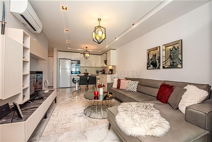 Квартира 1+1 с видом на море в районе Каргыджак