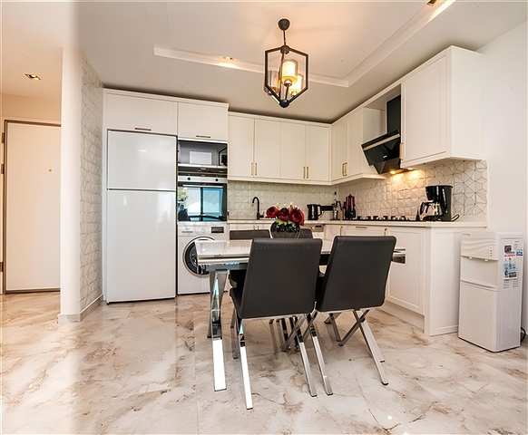 Квартира 1+1 с видом на море в районе Каргыджак