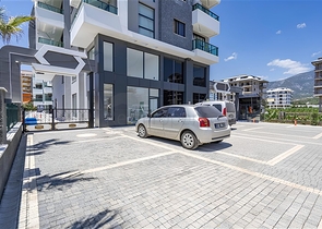 Квартира 1+1 с видом на море в районе Каргыджак