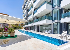 Квартира 1+1 с видом на море в районе Каргыджак