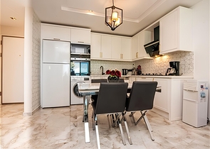 Квартира 1+1 с видом на море в районе Каргыджак