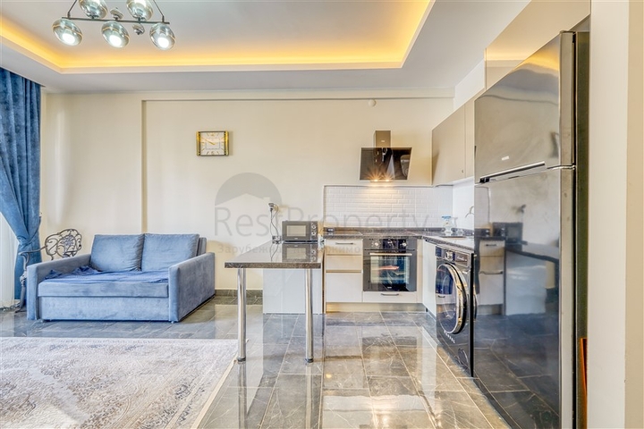 Квартира 1+1 в новом жилом комплексе района Махмутлар