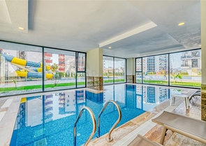 Квартира 1+1 в новом жилом комплексе района Махмутлар