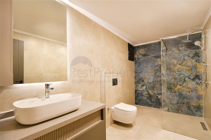 Трехкомнатная квартира в районе Тосмур