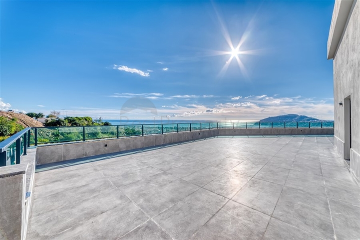 Современная роскошная вилла в центре Джикджилли с панорамным видом на море