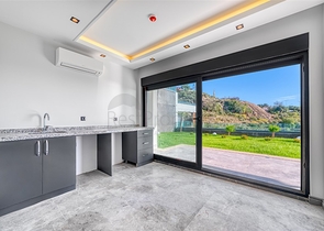 Современная роскошная вилла в центре Джикджилли с панорамным видом на море