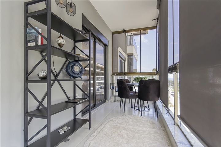 Уютная меблированная квартира 1+1 у моря в развитом комплексе