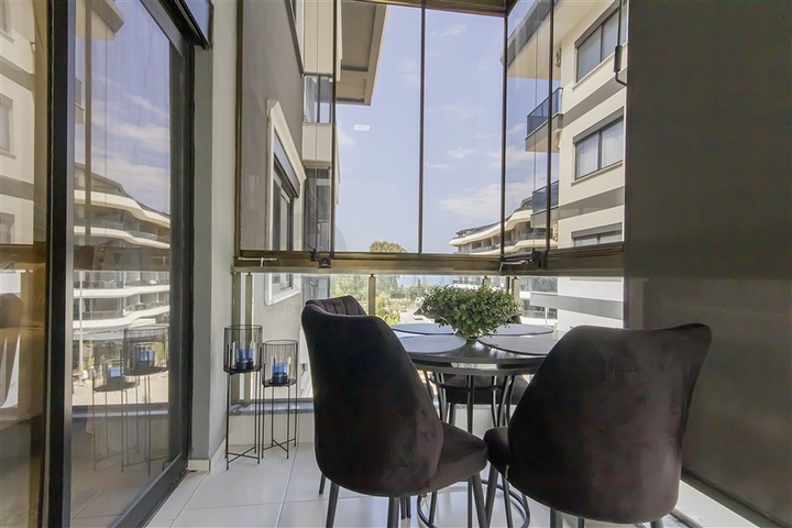 Уютная меблированная квартира 1+1 у моря в развитом комплексе