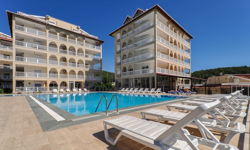 Просторная квартира 2+1 с видом на море в тихом районе Алании 