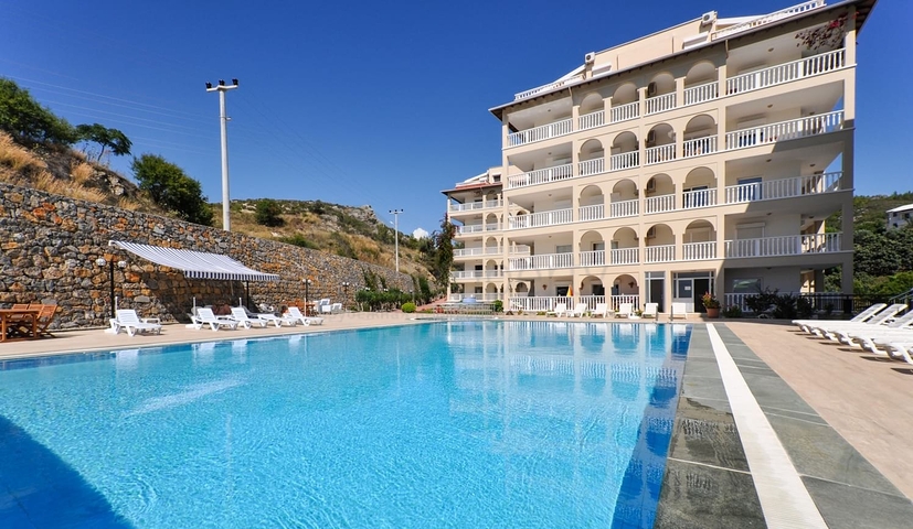 Просторная квартира 2+1 с видом на море в тихом районе Алании 